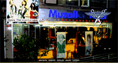 Desktop Screenshot of muzaffertopal.com